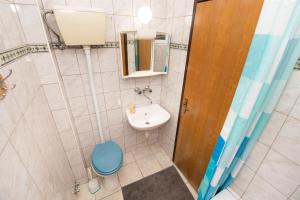 Koupelna v ubytování Apartment Mijo + 19 fotografií