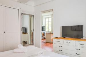 Μια τηλεόραση ή/και κέντρο ψυχαγωγίας στο Appartement Rochalice - Welkeys