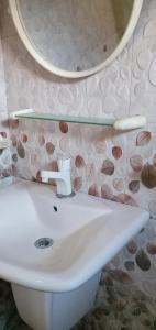 Koupelna v ubytování Pravindi Guest Home + 37 fotografií