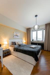 Posteľ alebo postele v izbe v ubytovaní Old Town Vintage Apartment Sturova