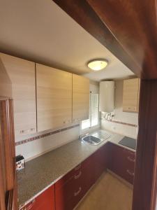 A kitchen or kitchenette at Atiko La Vista