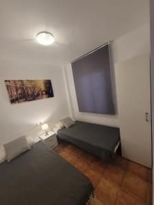 A bed or beds in a room at Atiko La Vista