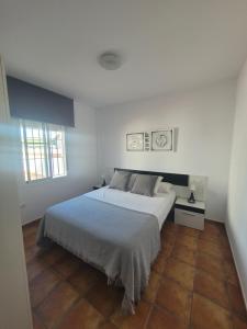 A bed or beds in a room at Atiko La Vista