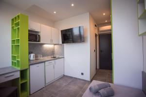 Kuchyň nebo kuchyňský kout v ubytování DORM BG pet-friendly Aparthotel