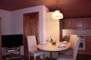 TV a/nebo společenská místnost v ubytování Landhaus Johanna