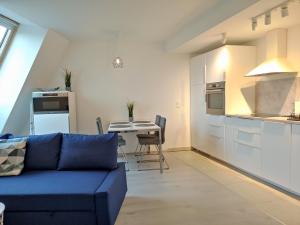 Kuchyňa alebo kuchynka v ubytovaní Sunshine Residence Deluxe Apartment