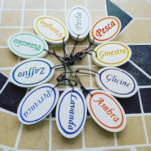 a bunch of colored buttons attached to a chain at Hotel Gli Acquerelli in Portoferraio