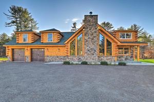 a log home with a large driveway at Unadilla Cabin on 50 Acres and Fire Pit and Creek in Unadilla