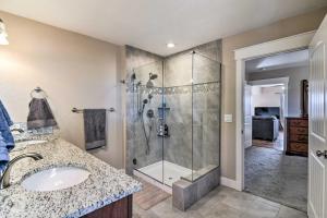 a bathroom with a shower and a sink at Cozy Retreat with Yard Space about 11 Mi to Longmont! in Platteville +17 photos