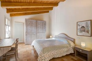 Katil atau katil-katil dalam bilik di Le Peonie - Celestino