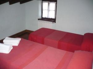 A bed or beds in a room at Kerizara Baserria
