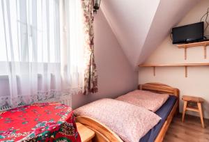Postel nebo postele na pokoji v ubytování Pokoje u Danusi