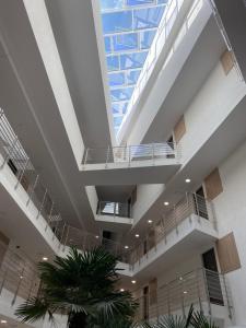 a large building with a skylight in the ceiling at Sunshine Residence Deluxe Apartment in Hévíz