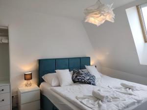 Posteľ alebo postele v izbe v ubytovaní Sunshine Residence Deluxe Apartment
