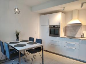 Kuchyňa alebo kuchynka v ubytovaní Sunshine Residence Deluxe Apartment