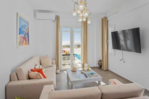 A television and/or entertainment centre at Coraline Villa