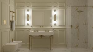 a bathroom with a sink and a toilet and a mirror at Hotel La Gemma in Florence