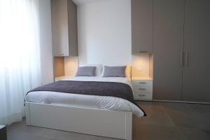 Postel nebo postele na pokoji v ubytování Piano Alto Home