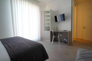 TV a/nebo společenská místnost v ubytování Piano Alto Home