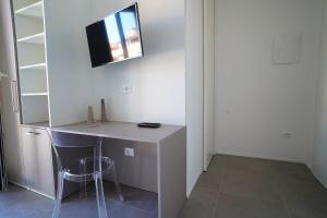 TV a/nebo společenská místnost v ubytování Piano Alto Home