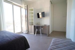 TV a/nebo společenská místnost v ubytování Piano Alto Home