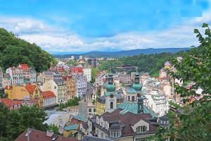 a view of a city with buildings and trees at Guesthouse "Malena" in Karlovy Vary
