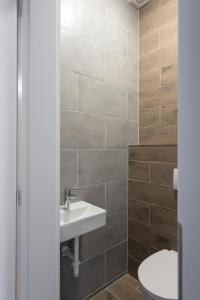 Ένα μπάνιο στο Aranygesztenye Apartmanház
