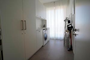Kuchyň nebo kuchyňský kout v ubytování Piano Alto Home