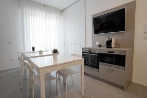 Kuchyň nebo kuchyňský kout v ubytování Piano Alto Home
