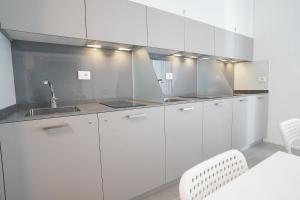 Kuchyň nebo kuchyňský kout v ubytování Piano Alto Home