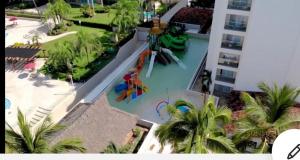 een luchtzicht op een waterpark in een resort bij BEACHFRONT 14 Floor in Puerto Vallarta