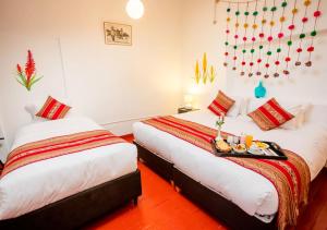 Cama o camas de una habitación en Hotel Kuska Home