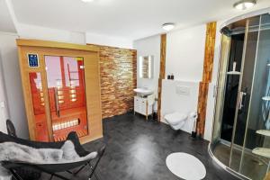Koupelna v ubytování Appartement confortable avec un sauna