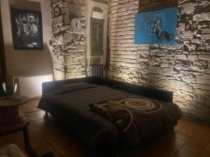 A bed or beds in a room at Habitació polivalent al centre de Manresa