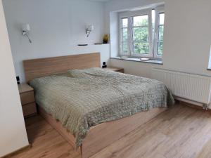 Posteľ alebo postele v izbe v ubytovaní Apartament De Lux LIDIA
