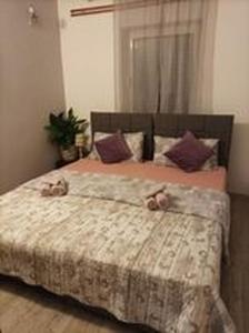 Posteľ alebo postele v izbe v ubytovaní Studio apartman"Mirjana", Podhum 368