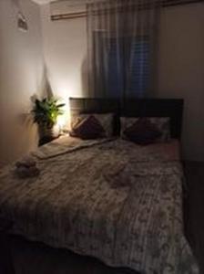 Posteľ alebo postele v izbe v ubytovaní Studio apartman"Mirjana", Podhum 368