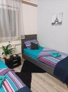 Posteľ alebo postele v izbe v ubytovaní Studio apartman"Mirjana", Podhum 368
