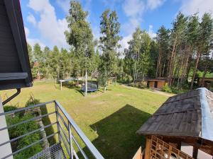 an aerial view of a yard with a playground at Bukowa Ostoja in Nakielno