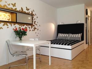 Tempat tidur dalam kamar di Gorgeous central flat with garage