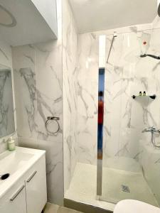 Ванна кімната в Pasaje Apartamentos