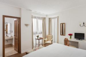 Postel nebo postele na pokoji v ubytování Hotel Amadeus Sevilla + 37 fotografií