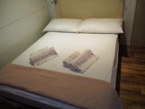 Postel nebo postele na pokoji v ubytování Camping PINUS