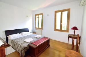 Posteľ alebo postele v izbe v ubytovaní Savorgnan Tricamere con terrazza