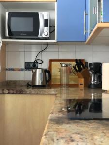 A kitchen or kitchenette at 110 square meters, 5 min of all-Best area of Las Palmas