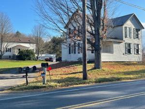 a house on the side of the road with a streeturrency sidx sidx sidx sidx at Lovely Rural 1 Bedroom Apartment in St Mary’s in Saint Marys