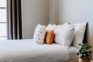 Federal Hotel Mudgee客房内的一张或多张床位