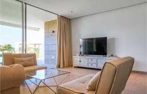 A television and/or entertainment centre at Gorgeous Apartment In Chipiona