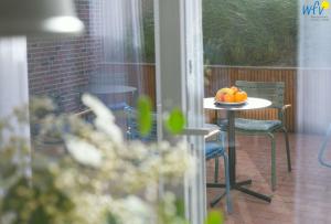 Balkón nebo terasa v ubytování Töwerhus - Wohnung Seestern