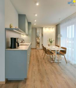 Kuchyň nebo kuchyňský kout v ubytování Toewerhus - Wohnung Muschel
